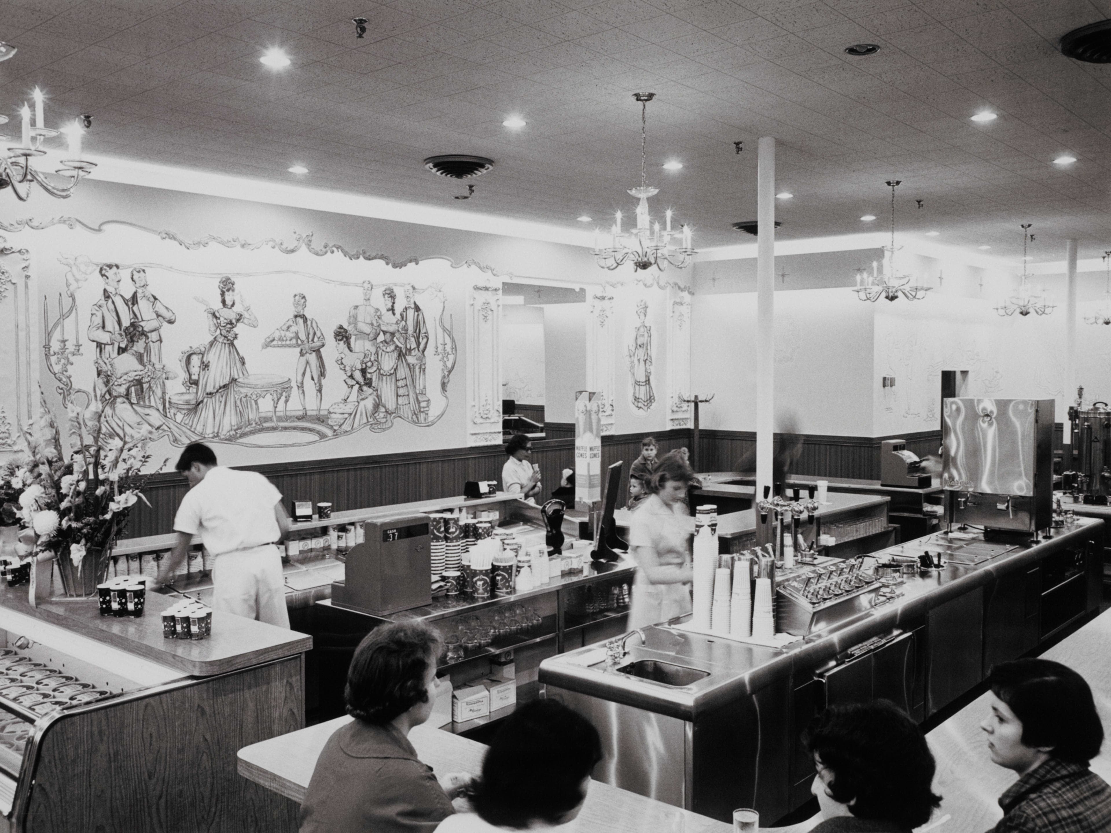 Newport Creamery vintage ice cream counter with murals and chandeliers, 1950s